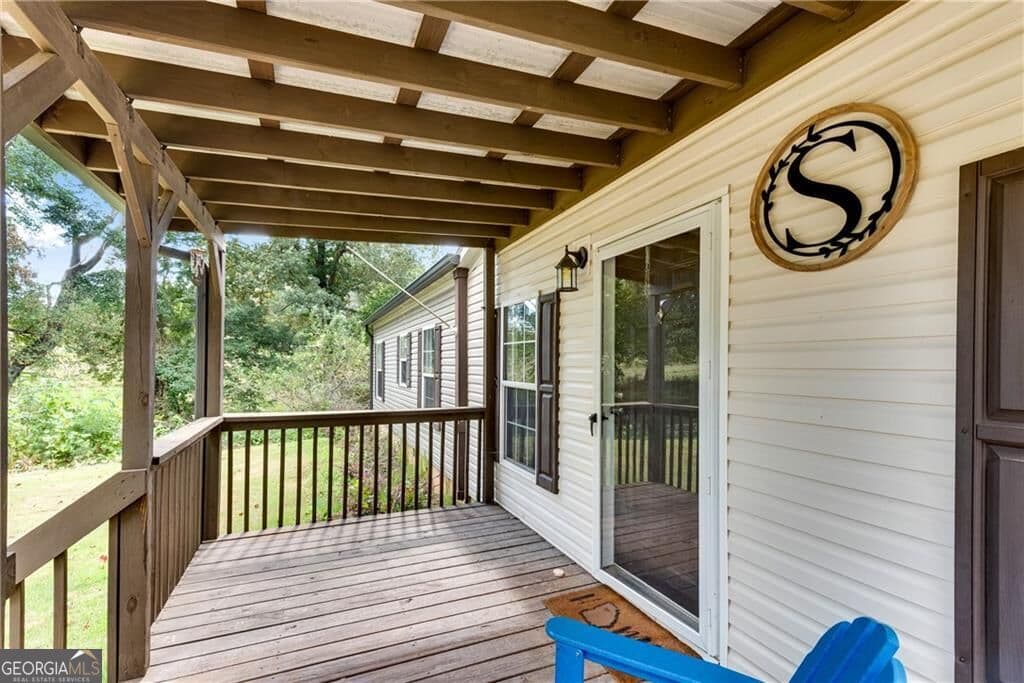 4 bedroom, 2 bathroom, 2,052 sq ft single family residence for sale at 4353 Flatbottom Road, Ball Ground, GA 30107 — photo 4