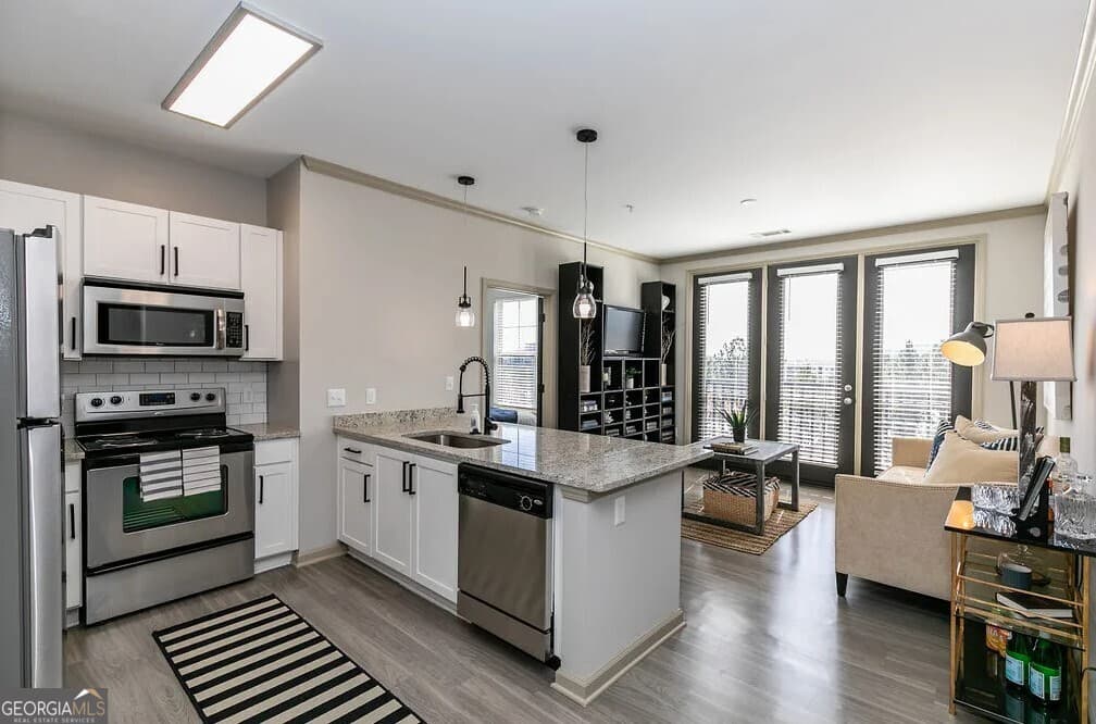 1 bedroom, 2 bathroom, 965 sq ft apartment for rent at 1000 Ashwood Parkway 1210, Dunwoody, GA 30338 for $2,016 a month — photo 2