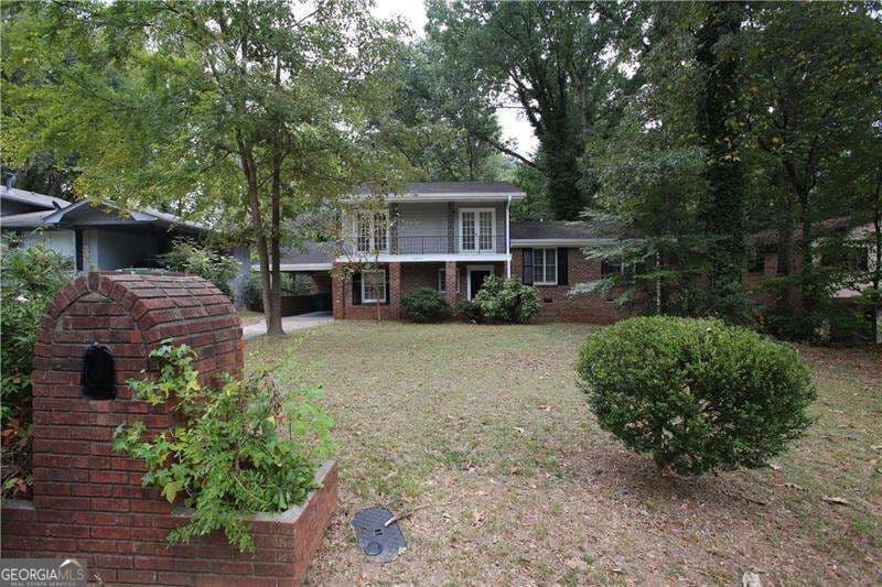 4 bedroom, 2 bathroom, 2,074 sq ft single family residence for sale at 3093 Thrasher Circle, Decatur, GA 30032 — photo 2