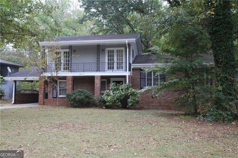 4 bedroom, 2 bathroom, 2,074 sq ft single family residence for sale at 3093 Thrasher Circle, Decatur, GA 30032 — photo 1 of 42