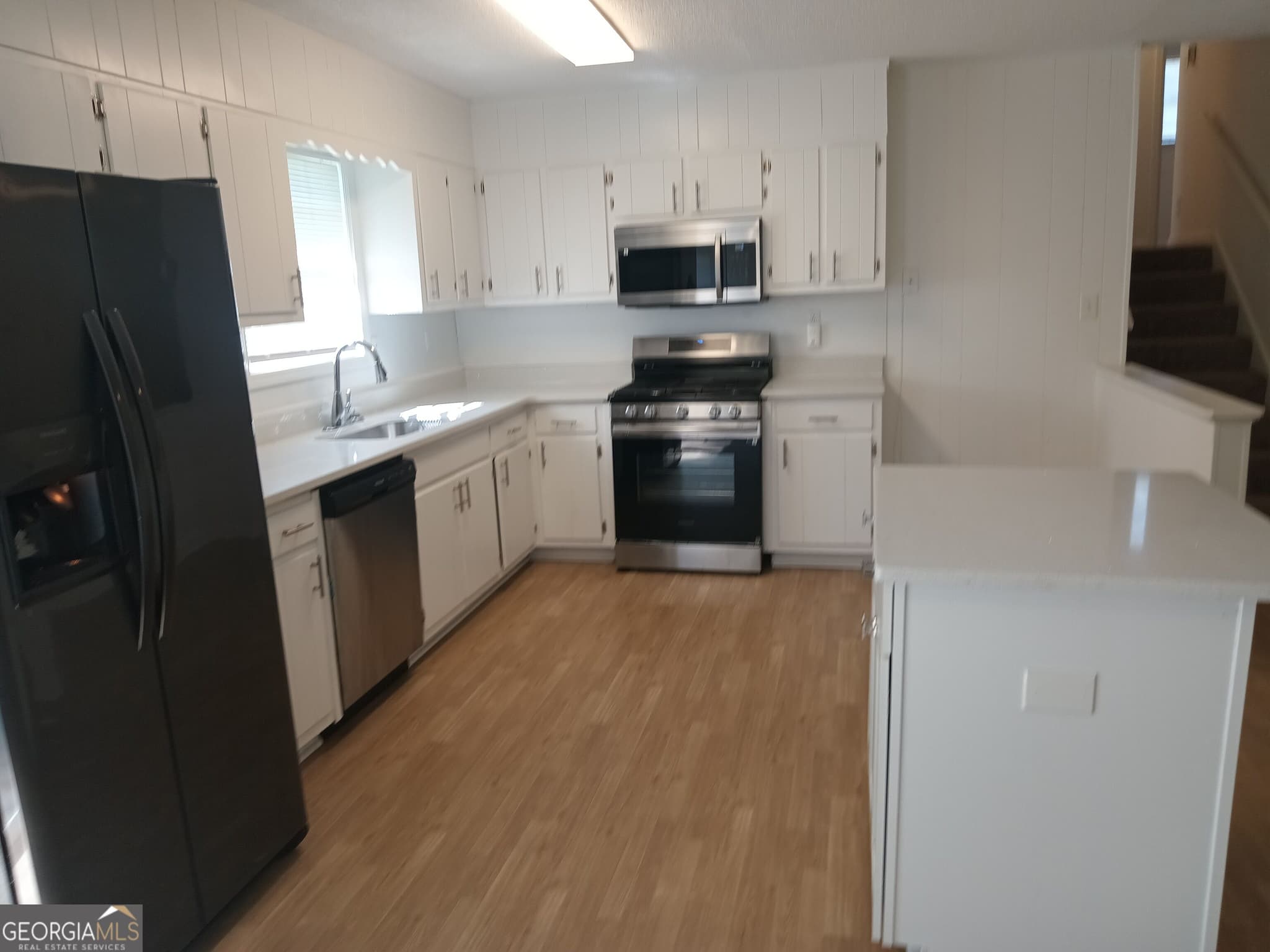 3 bedroom, 2.5 bathroom, 1,208 sq ft single family residence for sale at 155 Rockfort Court, South Fulton, GA 30349 — photo 6