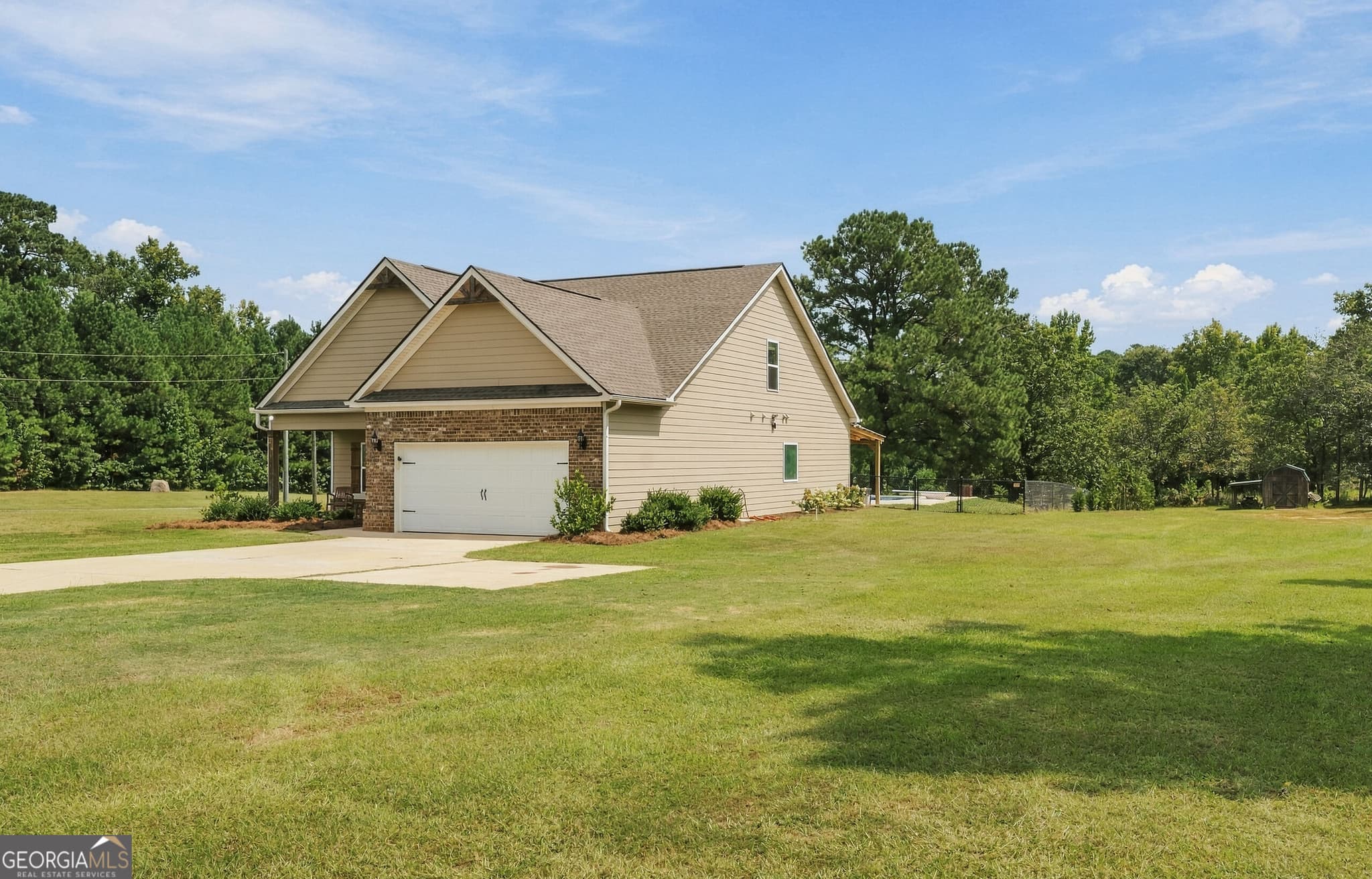 4 bedroom, 3.5 bathroom, 2,339 sq ft single family residence for sale at 279 Davis Road, Gray, GA 31032 — photo 2