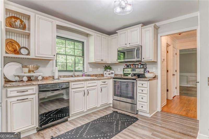 4 bedroom, 3.5 bathroom, 3,201 sq ft single family residence for sale at 323 Schoolhouse Road, Rockmart, GA 30153 — photo 6