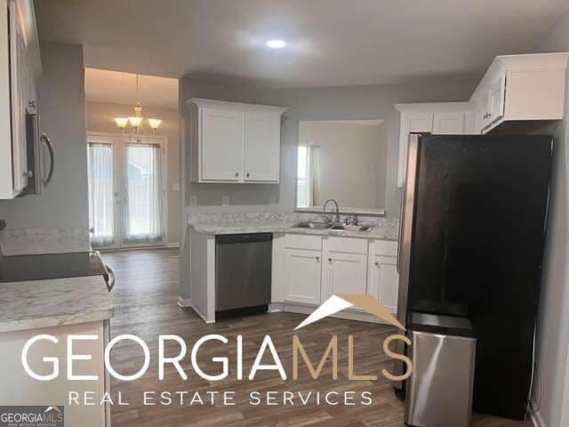 3 bedroom, 2 bathroom, 1,492 sq ft single family residence for sale at 131 Savannah Way, Milner, GA 30257 — photo 5