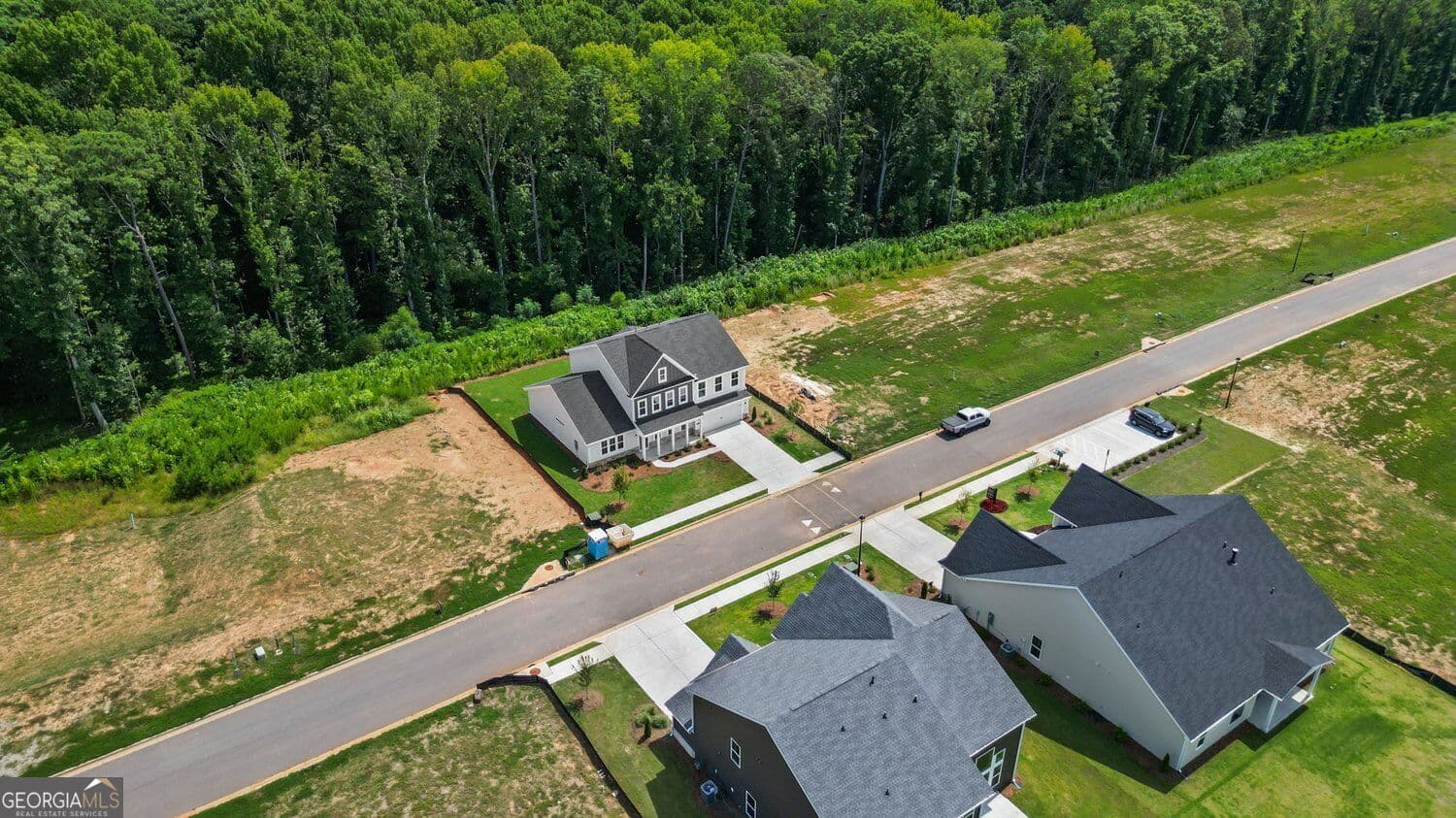 5 bedroom, 3.5 bathroom, 3,259 sq ft single family residence for sale at 159 Hidden Fields Way, Hoschton, GA 30548 — photo 3