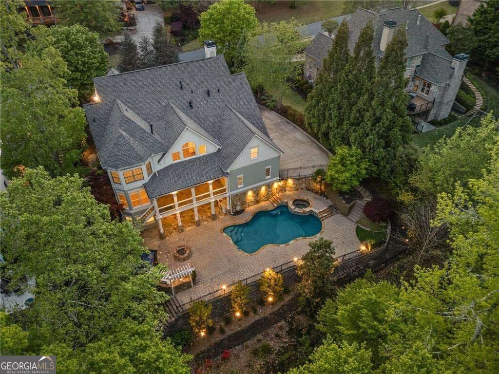 5 bedroom, 6 bathroom, 7,207 sq ft single family residence for sale at 2480 Flint Creek Drive, Cumming, GA 30041 — photo 1 of 94