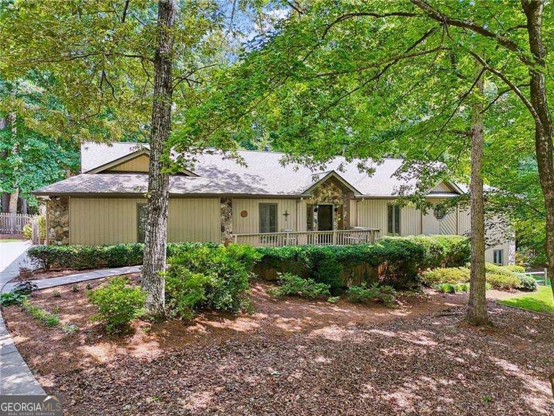 5 bedroom, 3.5 bathroom, 4,491 sq ft single family residence sold at 211 Black Kettle Lane, Johns Creek, GA 30022