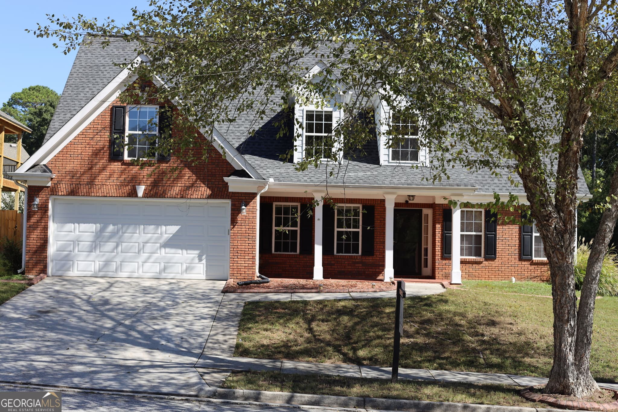 4 bedroom, 2.5 bathroom, 2,274 sq ft single family residence for sale at 4120 Savannah Ridge Trace, Loganville, GA 30052 — photo 2