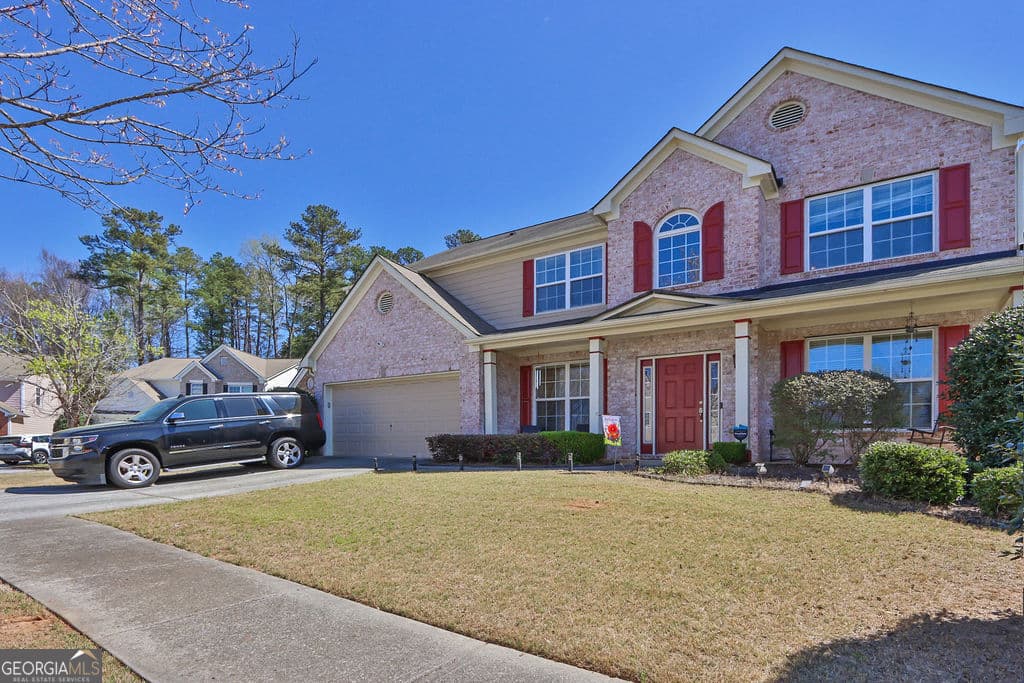 5 bedroom, 2.5 bathroom, 2,907 sq ft single family residence for sale at 2337 Longmont Drive, Lawrenceville, GA 30044 — photo 2