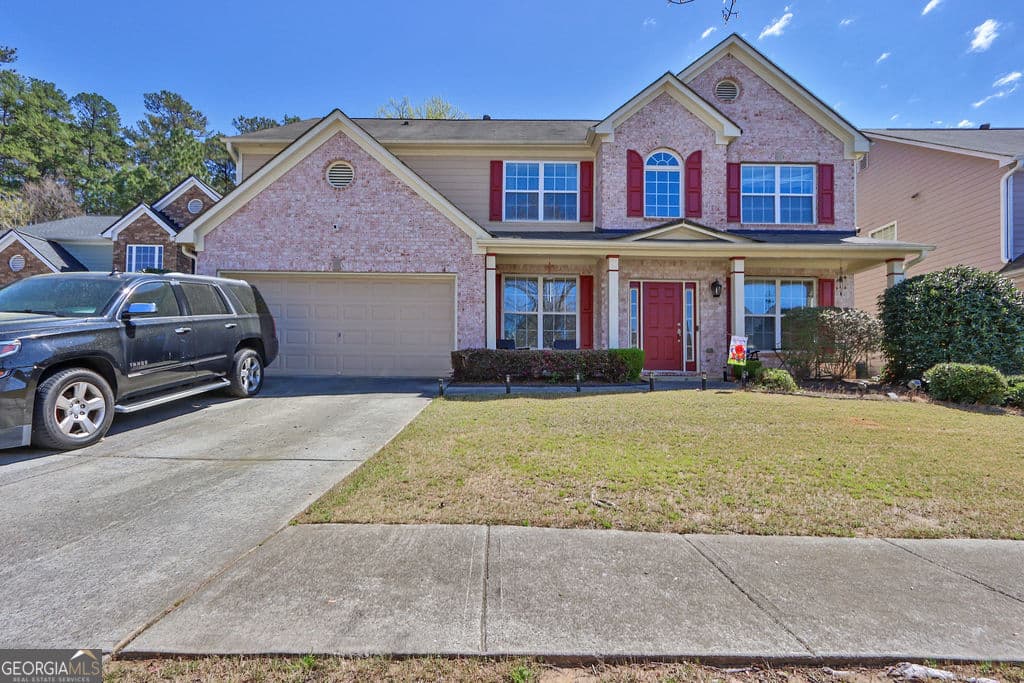 5 bedroom, 2.5 bathroom, 2,907 sq ft single family residence for sale at 2337 Longmont Drive, Lawrenceville, GA 30044 — photo 1 of 37