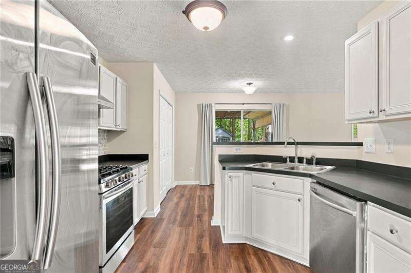 3 bedroom, 2.5 bathroom, 1,816 sq ft single family residence for sale at 4458 High Gate Drive, Acworth, GA 30101 — photo 7
