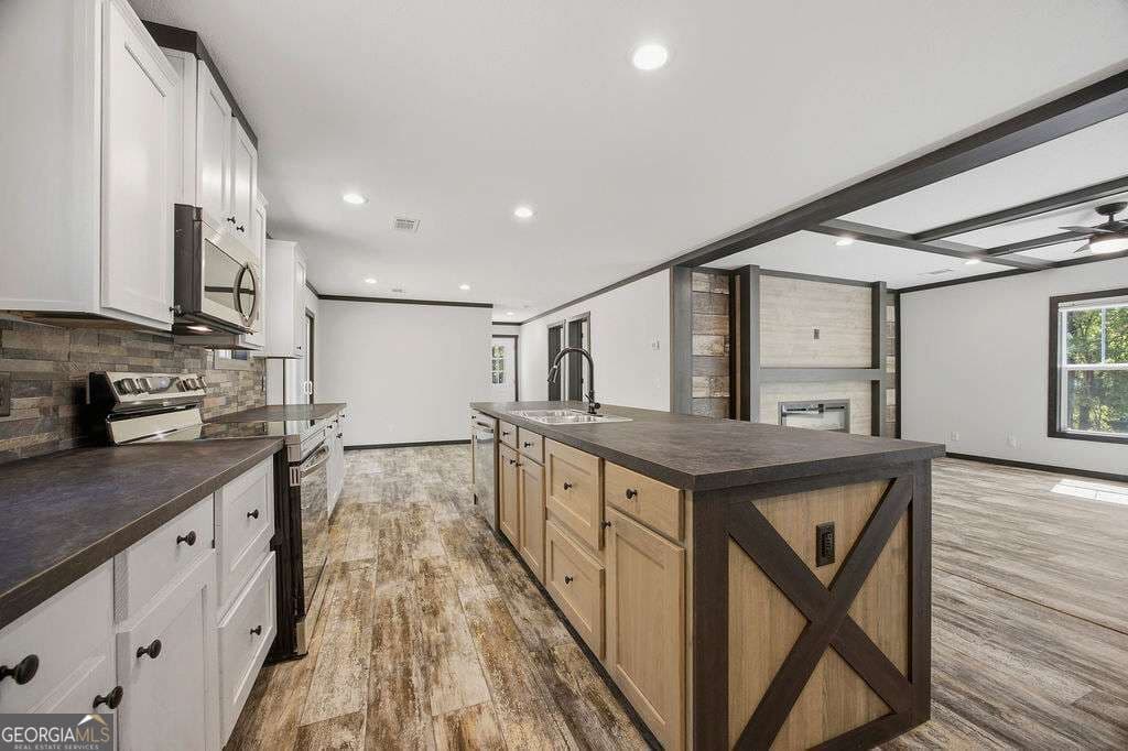3 bedroom, 2 bathroom, 1,560 sq ft manufactured home,single family residence for sale at 205 S Steel Bridge Road, Eatonton, GA 31024 — photo 9