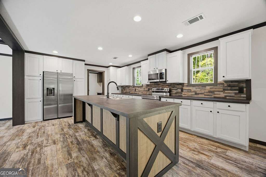 3 bedroom, 2 bathroom, 1,560 sq ft manufactured home,single family residence for sale at 205 S Steel Bridge Road, Eatonton, GA 31024 — photo 8