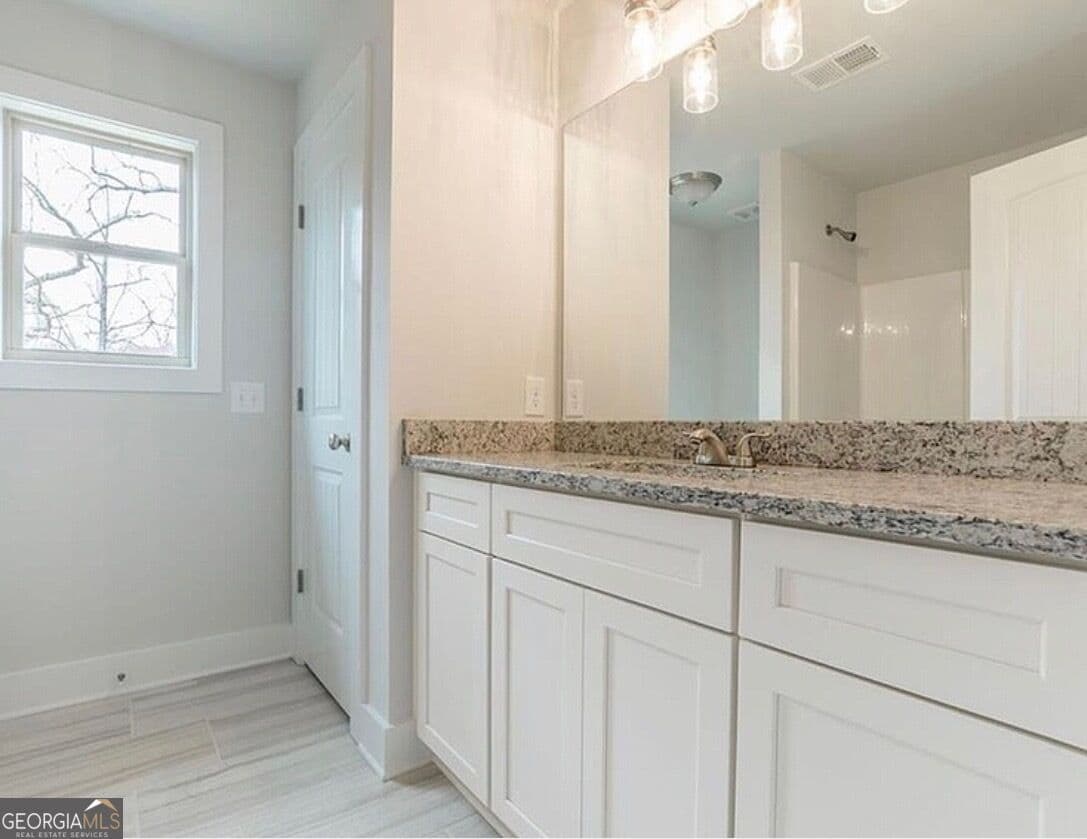3 bedroom, 2.5 bathroom, 1,476 sq ft single family residence for sale at 1880 Sawnee Trail, Cumming, GA 30041 — photo 7