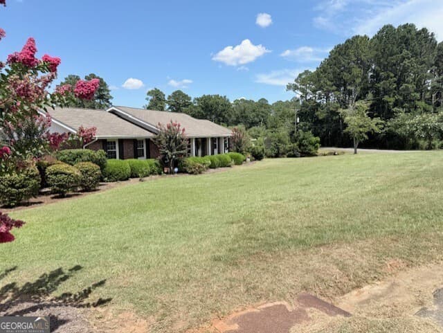 4 bedroom, 2 bathroom, 1,971 sq ft single family residence for sale at 142 Lakewood Drive, Blakely, GA 39823 — photo 2