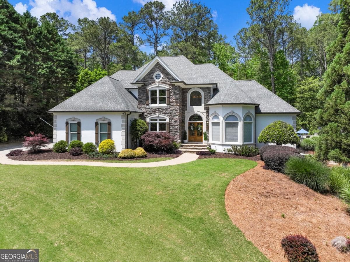 6 bedroom, 4.5 bathroom, 5,498 sq ft single family residence sold at 710 Richmond Glen Drive, Milton, GA 30004