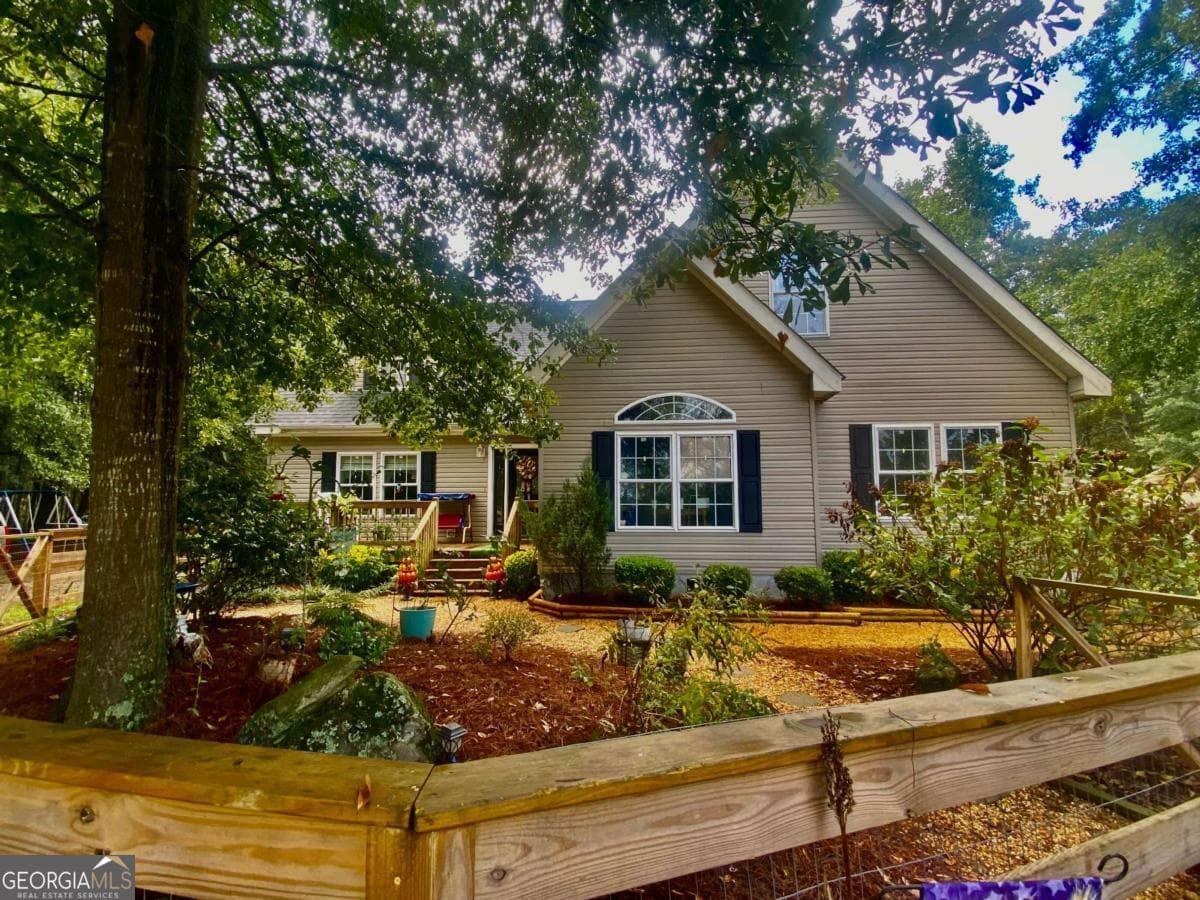 5 bedroom, 3.5 bathroom, 2,828 sq ft single family residence for sale at 290 Poplar Creek Road, Stephens, GA 30667 — photo 2