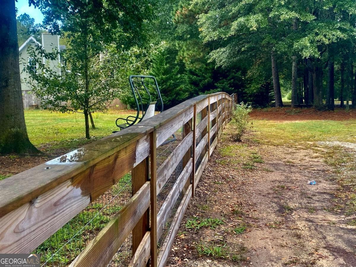 5 bedroom, 3.5 bathroom, 2,828 sq ft single family residence for sale at 290 Poplar Creek Road, Stephens, GA 30667 — photo 3