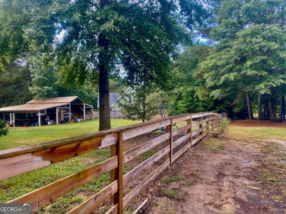 5 bedroom, 3.5 bathroom, 2,828 sq ft single family residence for sale at 290 Poplar Creek Road, Stephens, GA 30667 — photo 4