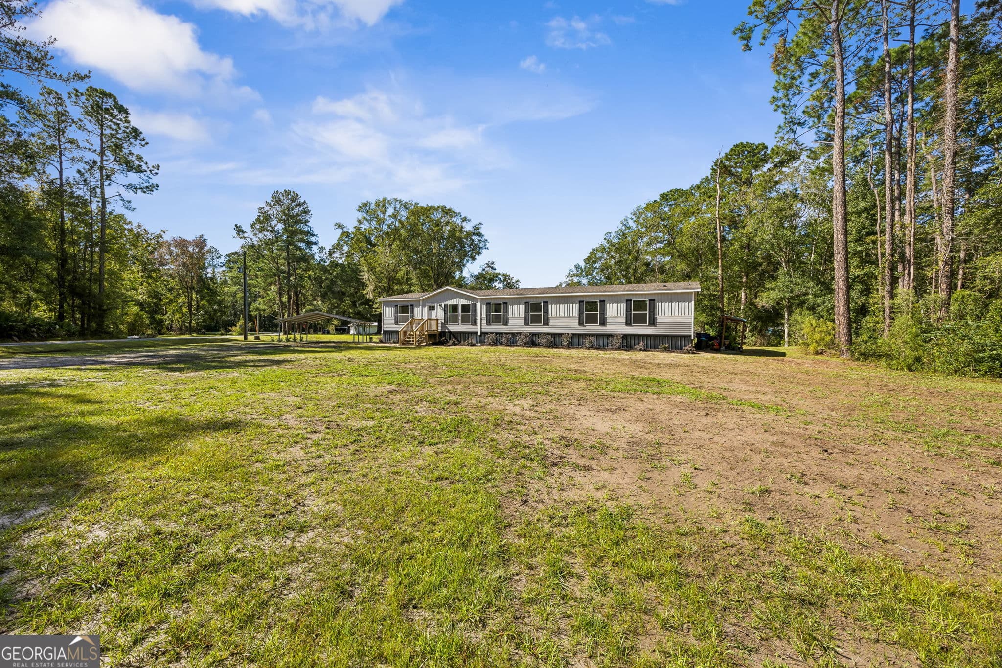 4 bedroom, 3 bathroom, 2,001 sq ft manufactured home,single family residence for sale at 209 Simpson Road, Kingsland, GA 31548 — photo 2