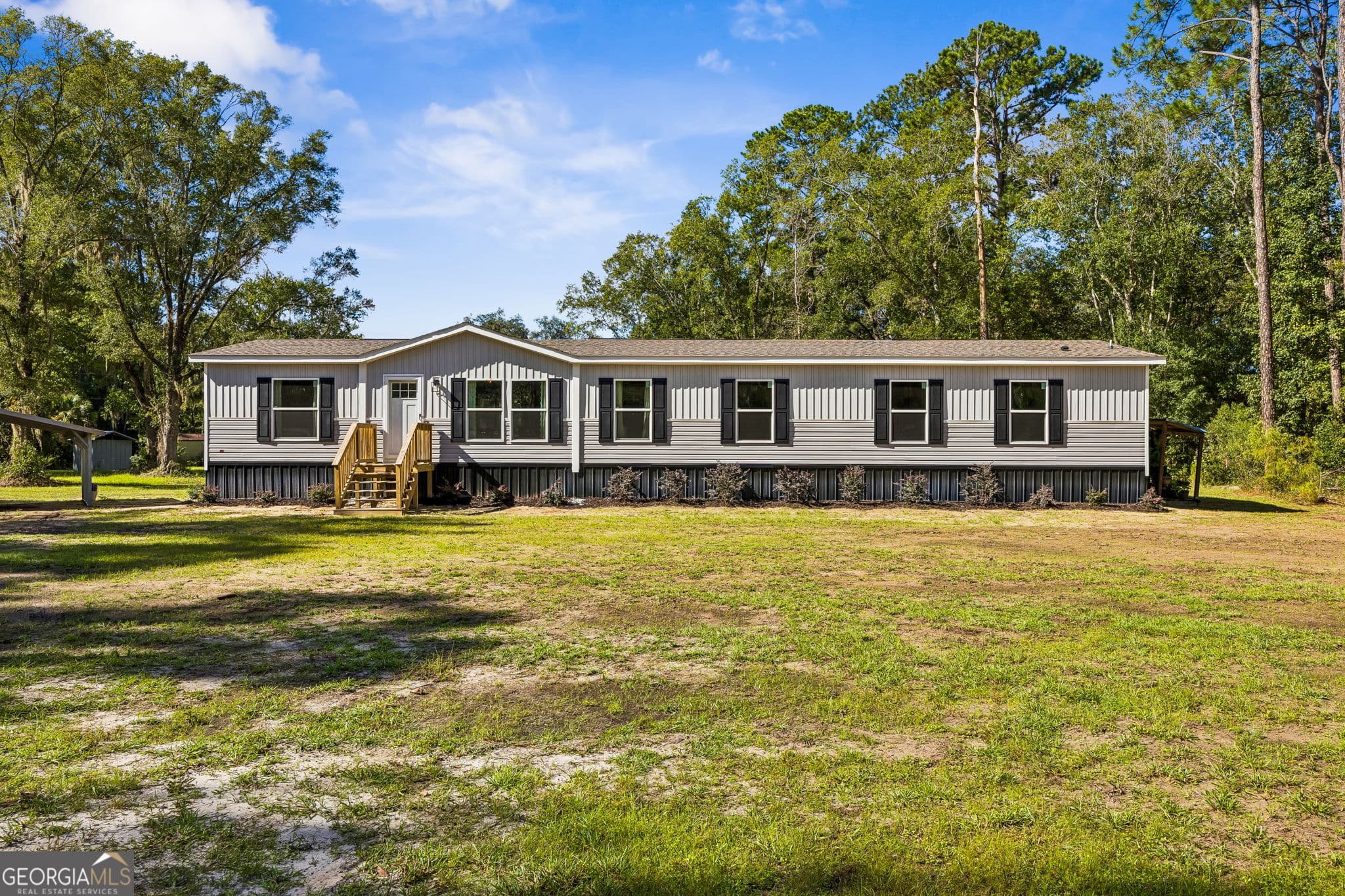 4 bedroom, 3 bathroom, 2,001 sq ft manufactured home,single family residence for sale at 209 Simpson Road, Kingsland, GA 31548