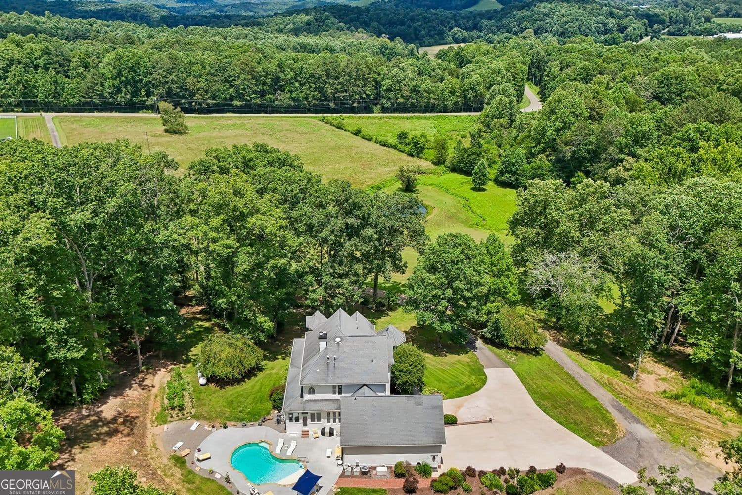 5 bedroom, 3.5 bathroom, 4,836 sq ft single family residence for sale at 4218 Roy Road, Ellijay, GA 30536 — photo 3