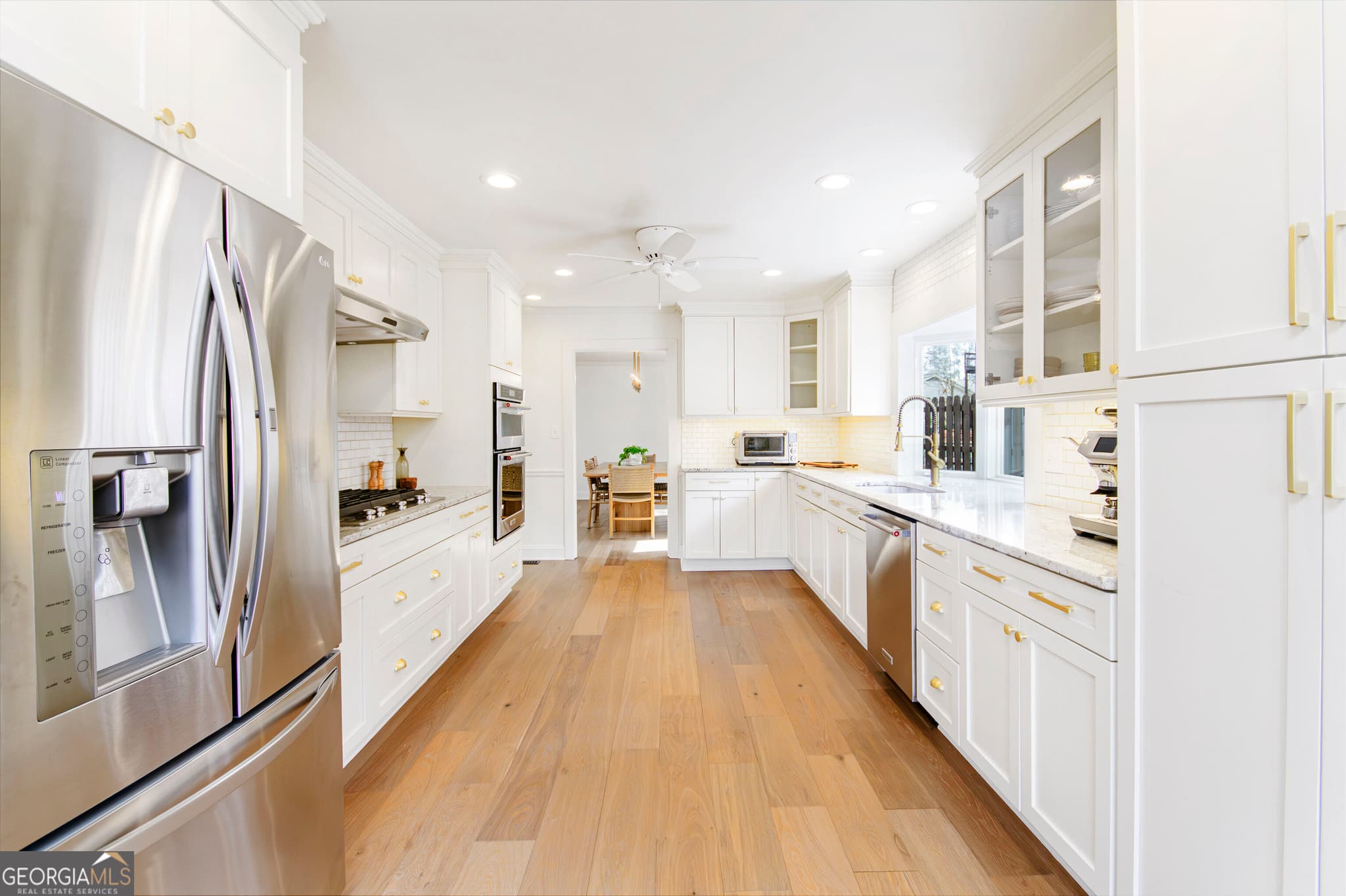 4 bedroom, 4 bathroom, 4,800 sq ft single family residence for sale at 10120 Kinross Road, Roswell, GA 30076 — photo 8