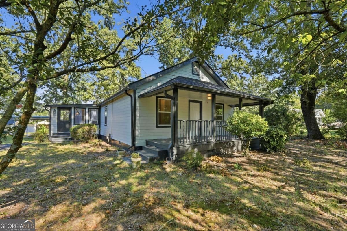 3 bedroom, 3 bathroom, 1,357 sq ft single family residence for sale at 1965 Holland Park Drive, Buford, GA 30519 — photo 4