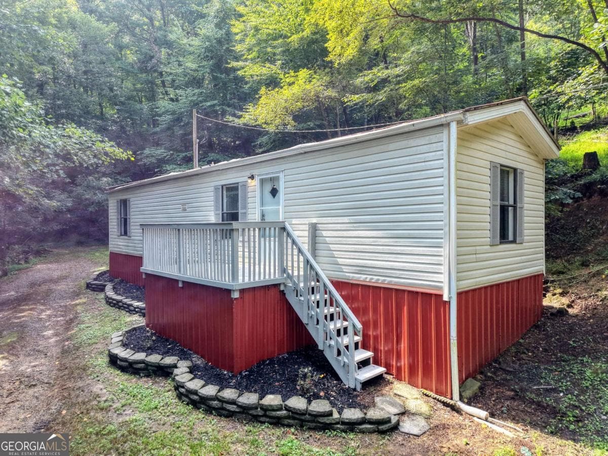 2 bedroom, 1 bathroom manufactured home,single family residence under contract at 8223 True Love Mountain Road, Young Harris, GA 30582 — photo 2
