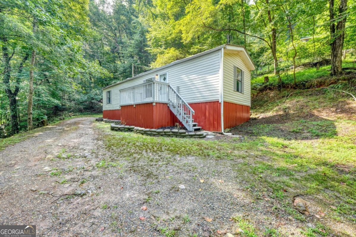 2 bedroom, 1 bathroom manufactured home,single family residence under contract at 8223 True Love Mountain Road, Young Harris, GA 30582 — photo 6