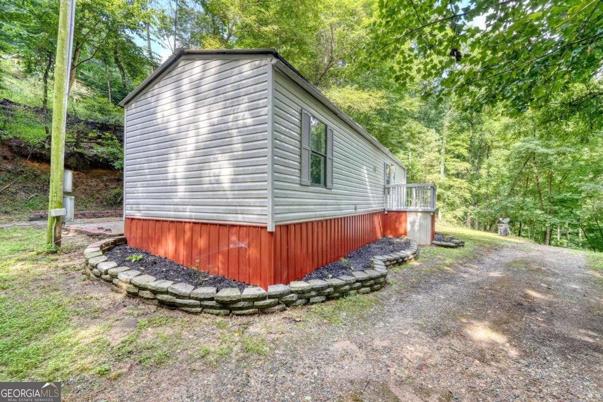 2 bedroom, 1 bathroom manufactured home,single family residence under contract at 8223 True Love Mountain Road, Young Harris, GA 30582 — photo 3