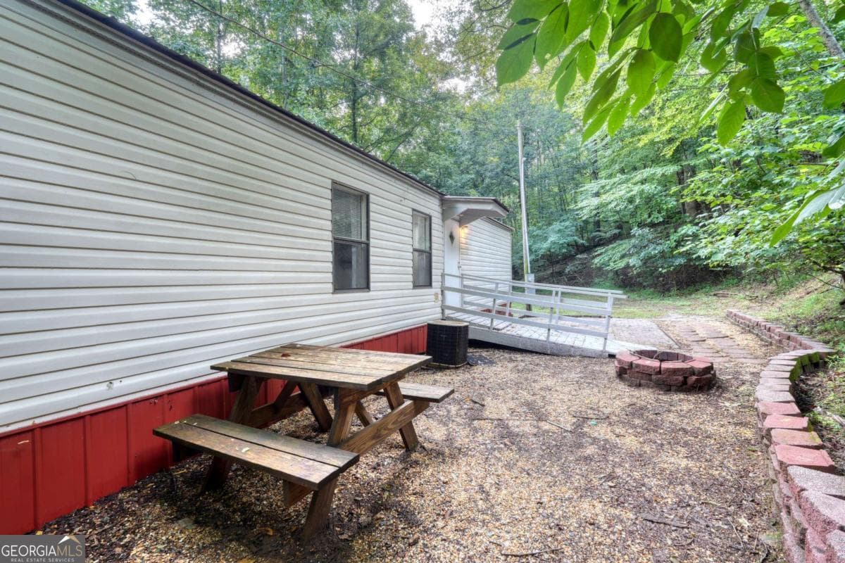 2 bedroom, 1 bathroom manufactured home,single family residence under contract at 8223 True Love Mountain Road, Young Harris, GA 30582 — photo 5