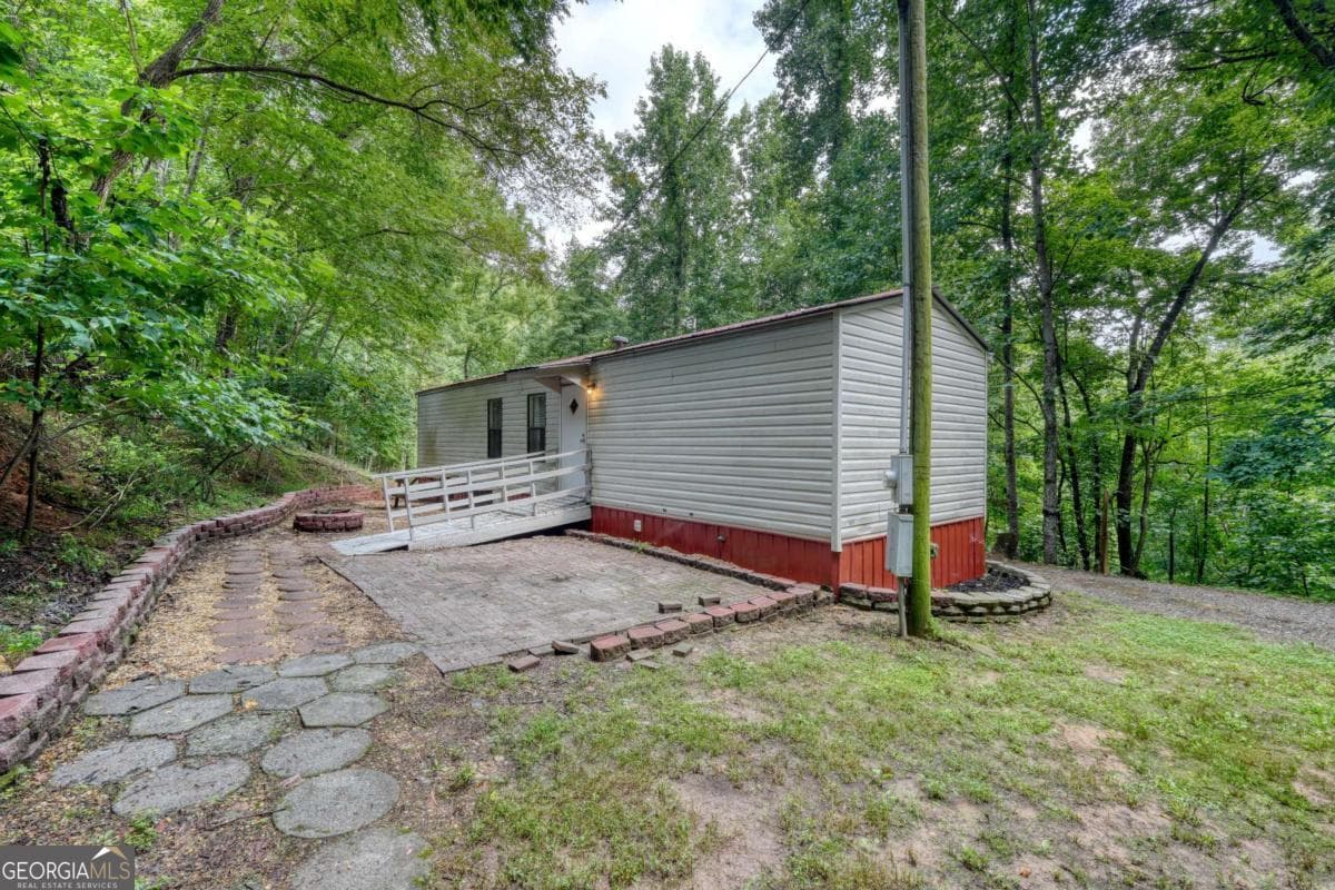 2 bedroom, 1 bathroom manufactured home,single family residence under contract at 8223 True Love Mountain Road, Young Harris, GA 30582 — photo 4