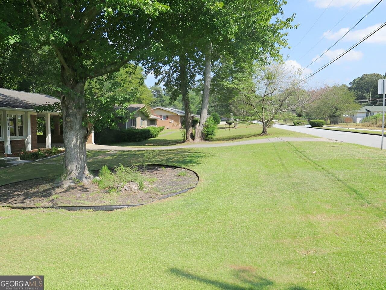 3 bedroom, 2 bathroom, 2,920 sq ft single family residence for sale at 2455 Thornton Drive, Atlanta, GA 30349 — photo 3