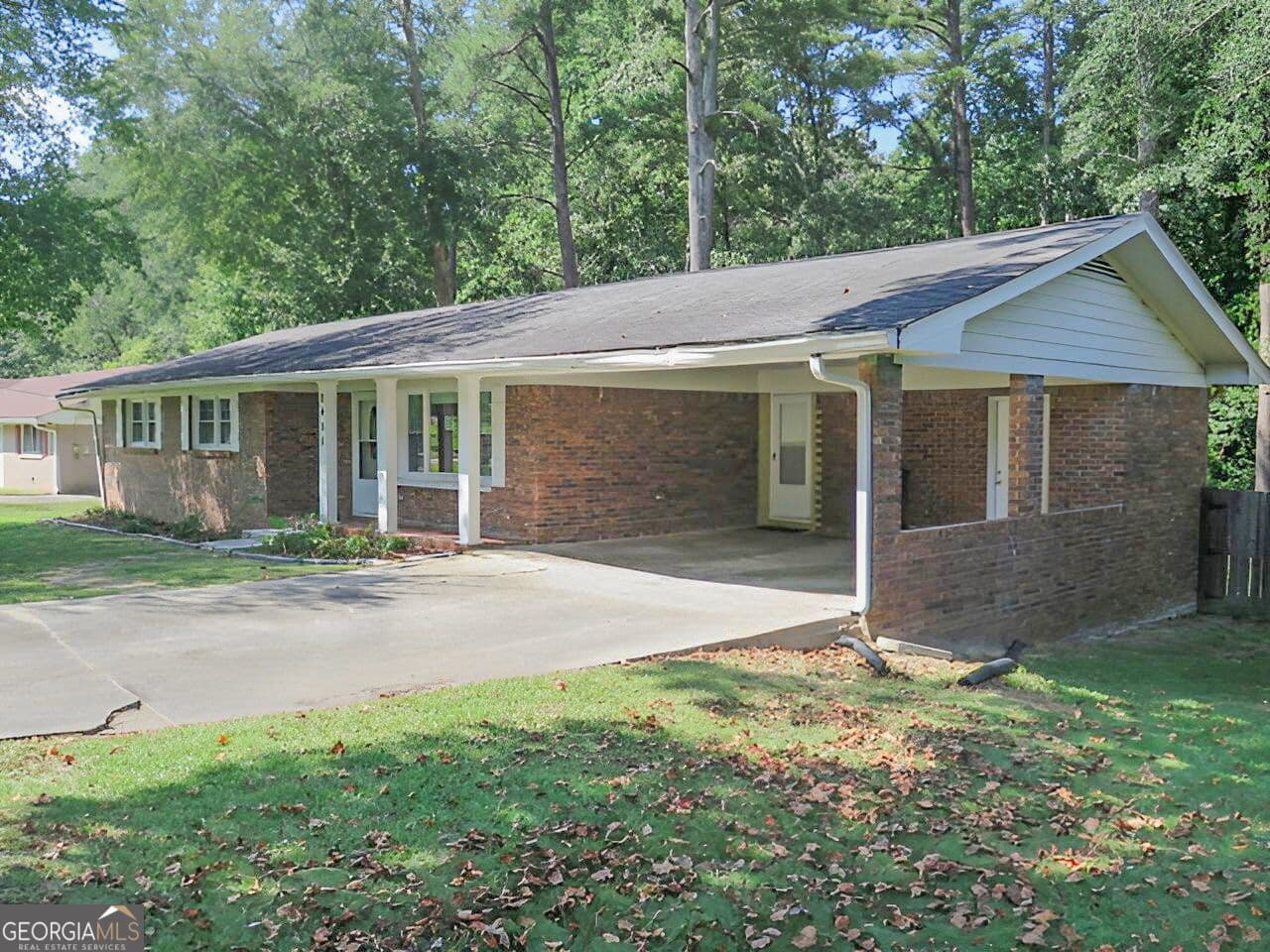 3 bedroom, 2 bathroom, 2,920 sq ft single family residence for sale at 2455 Thornton Drive, Atlanta, GA 30349 — photo 4