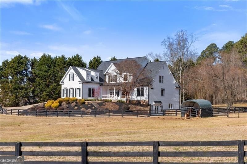6 bedroom, 4.5 bathroom, 5,325 sq ft single family residence sold at 100 Hunting Valley Trail, Cumming, GA 30040