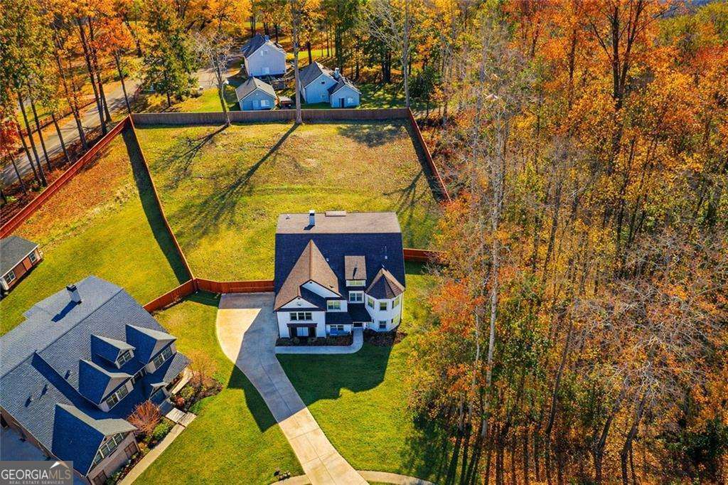 6 bedroom, 5 bathroom, 6,756 sq ft single family residence for sale at 2813 Carrick Court, Powder Springs, GA 30127 — photo 2