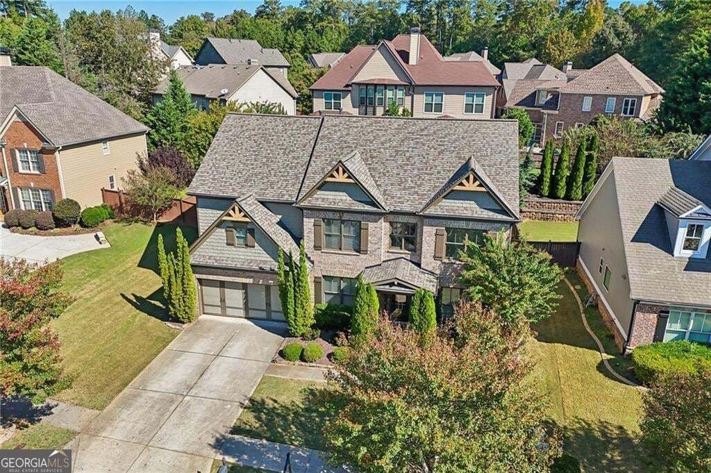5 bedroom, 4 bathroom, 3,257 sq ft single family residence for sale at 1146 Whisper Cove Drive, Buford, GA 30518 — photo 3