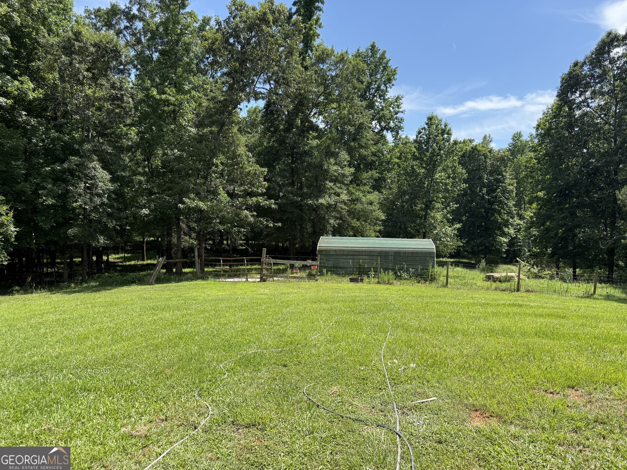 4 bedroom, 2.5 bathroom, 1,960 sq ft single family residence for sale at 408 Bowen Road, Milner, GA 30257 — photo 6