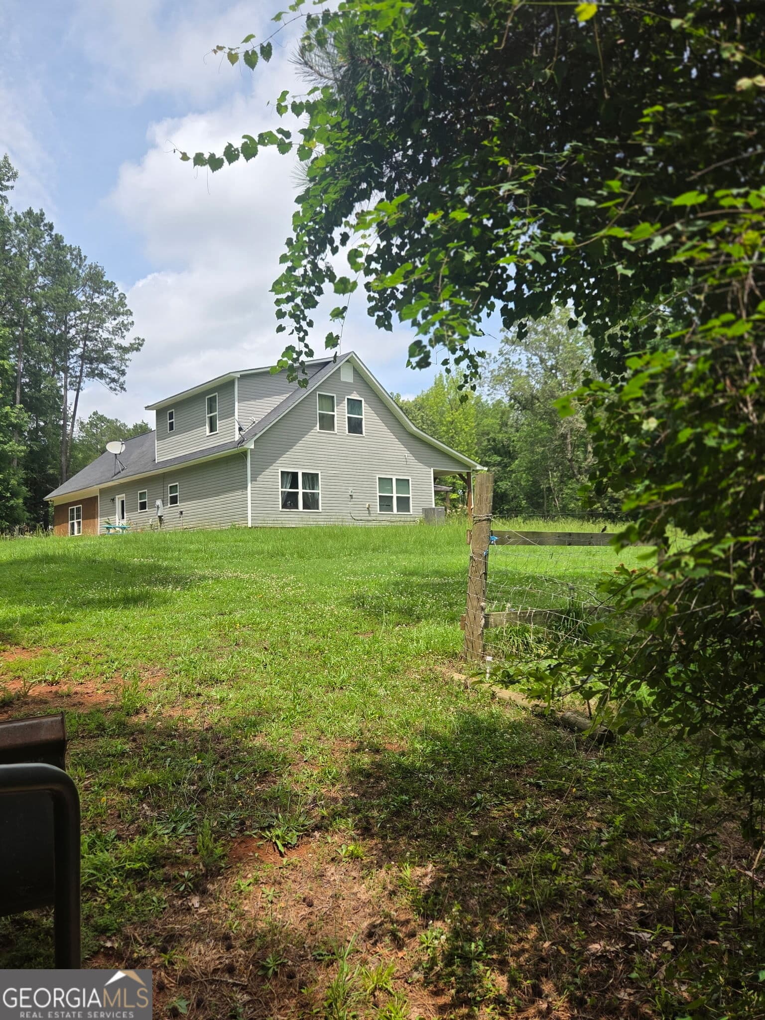 4 bedroom, 2.5 bathroom, 1,960 sq ft single family residence for sale at 408 Bowen Road, Milner, GA 30257 — photo 4