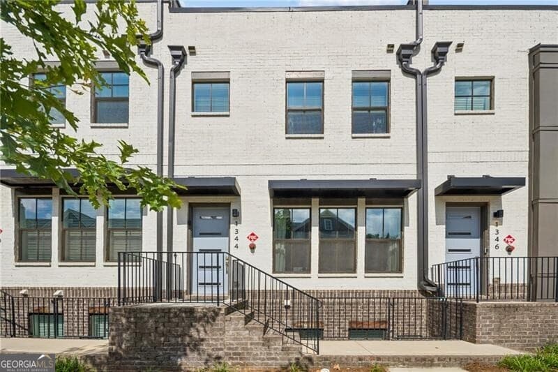 4 bedroom, 4.5 bathroom, 2,900 sq ft townhouse for sale at 1344 Booth Avenue, Atlanta, GA 30318 — photo 1 of 30