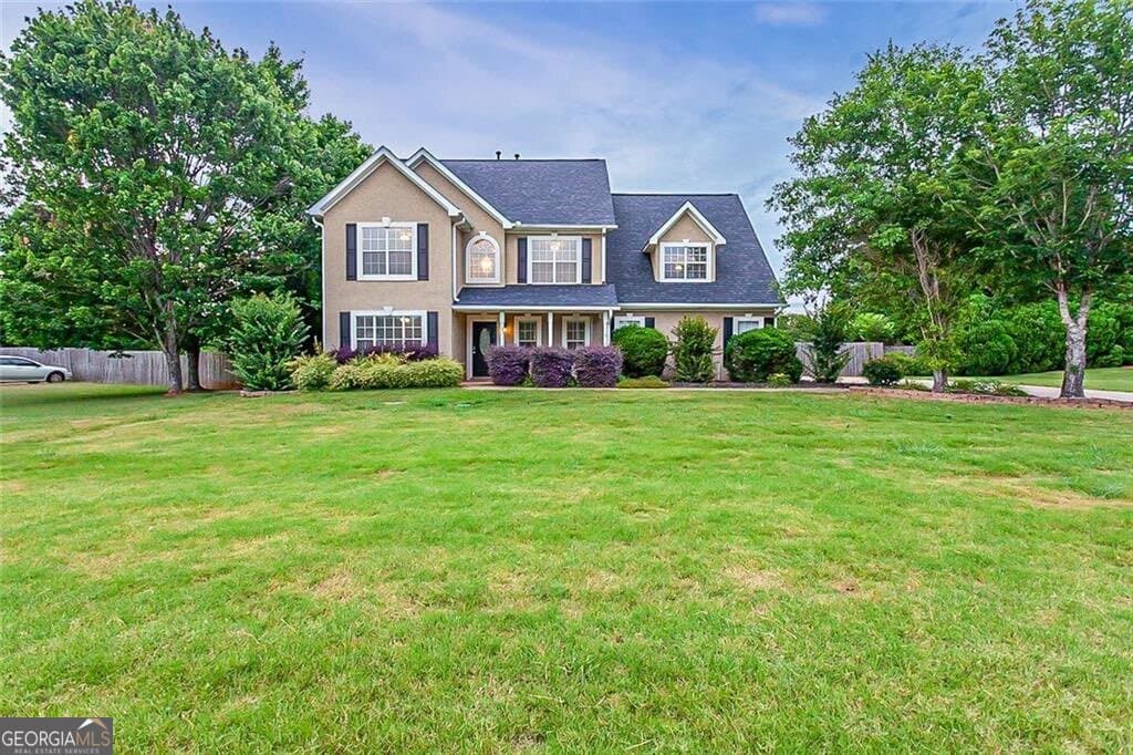 4 bedroom, 2.5 bathroom, 2,397 sq ft single family residence for sale at 112 Wyckliffe Drive, Locust Grove, GA 30248 — photo 1 of 36