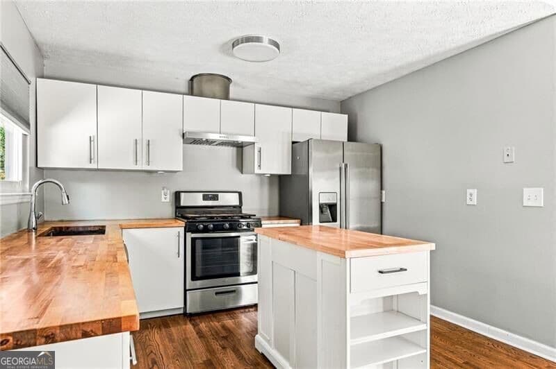 3 bedroom, 2 bathroom, 1,398 sq ft single family residence for sale at 3409 Hogan Drive, Kennesaw, GA 30152 — photo 10