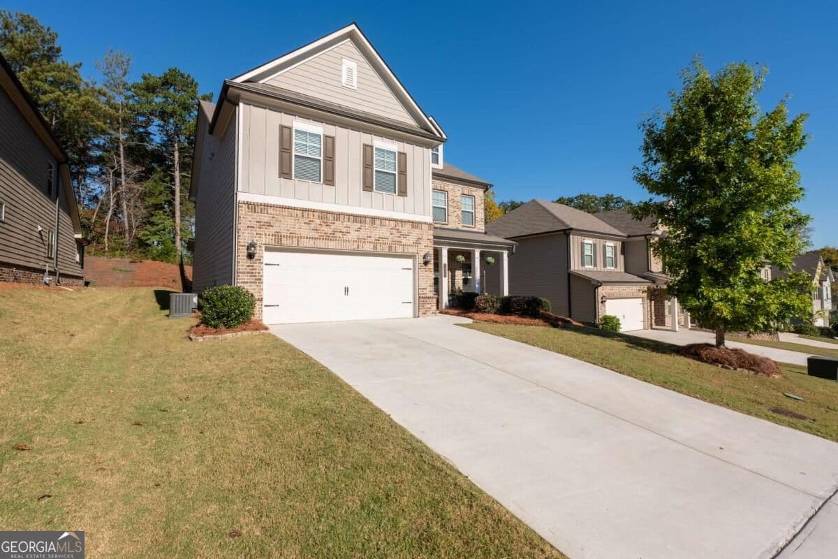5 bedroom, 4 bathroom, 2,842 sq ft single family residence for sale at 1826 Holman Forest Drive, Hoschton, GA 30548 — photo 3