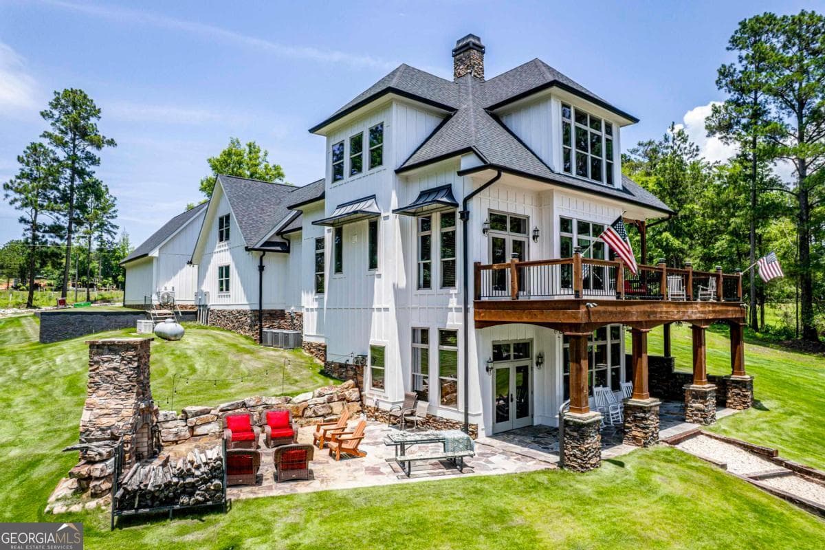 5 bedroom, 3.5 bathroom, 4,528 sq ft single family residence for sale at 202 Sinclair Road, Eatonton, GA 31024 — photo 3