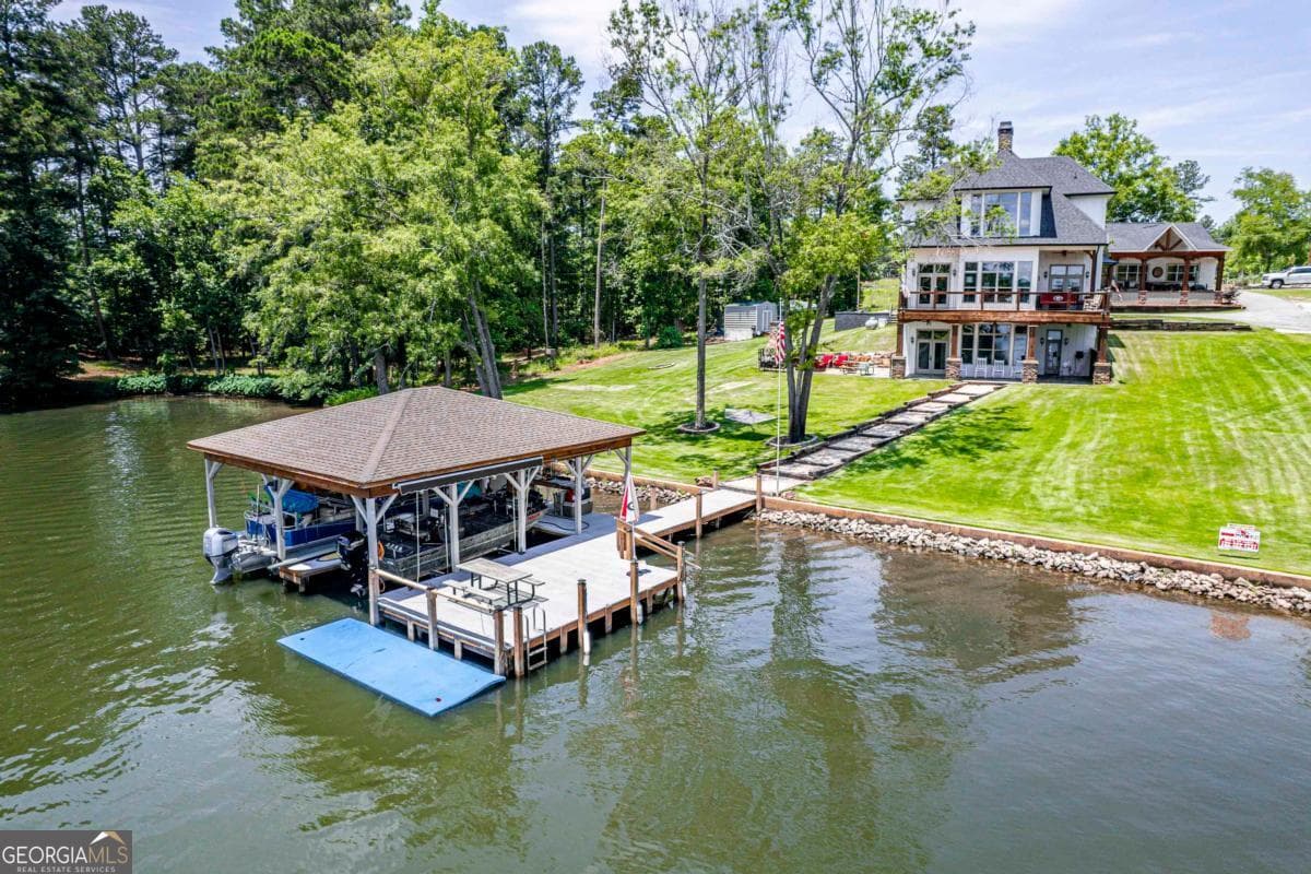 5 bedroom, 3.5 bathroom, 4,528 sq ft single family residence for sale at 202 Sinclair Road, Eatonton, GA 31024