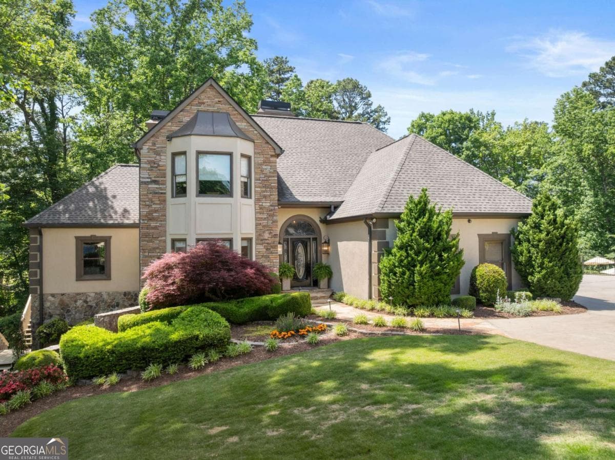 6 bedroom, 6.5 bathroom, 6,628 sq ft single family residence sold at 5840 Rock Springs Circle, Buford, GA 30518