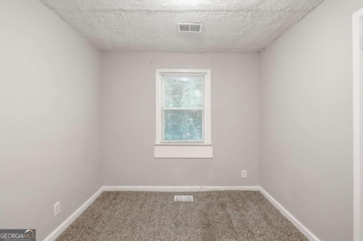 3 bedroom, 1 bathroom, 1,120 sq ft single family residence for sale at 1800 Oakmont Drive, Atlanta, GA 30314 — photo 9