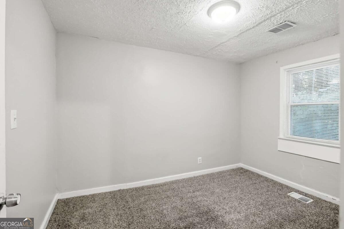 3 bedroom, 1 bathroom, 1,120 sq ft single family residence for sale at 1800 Oakmont Drive, Atlanta, GA 30314 — photo 8