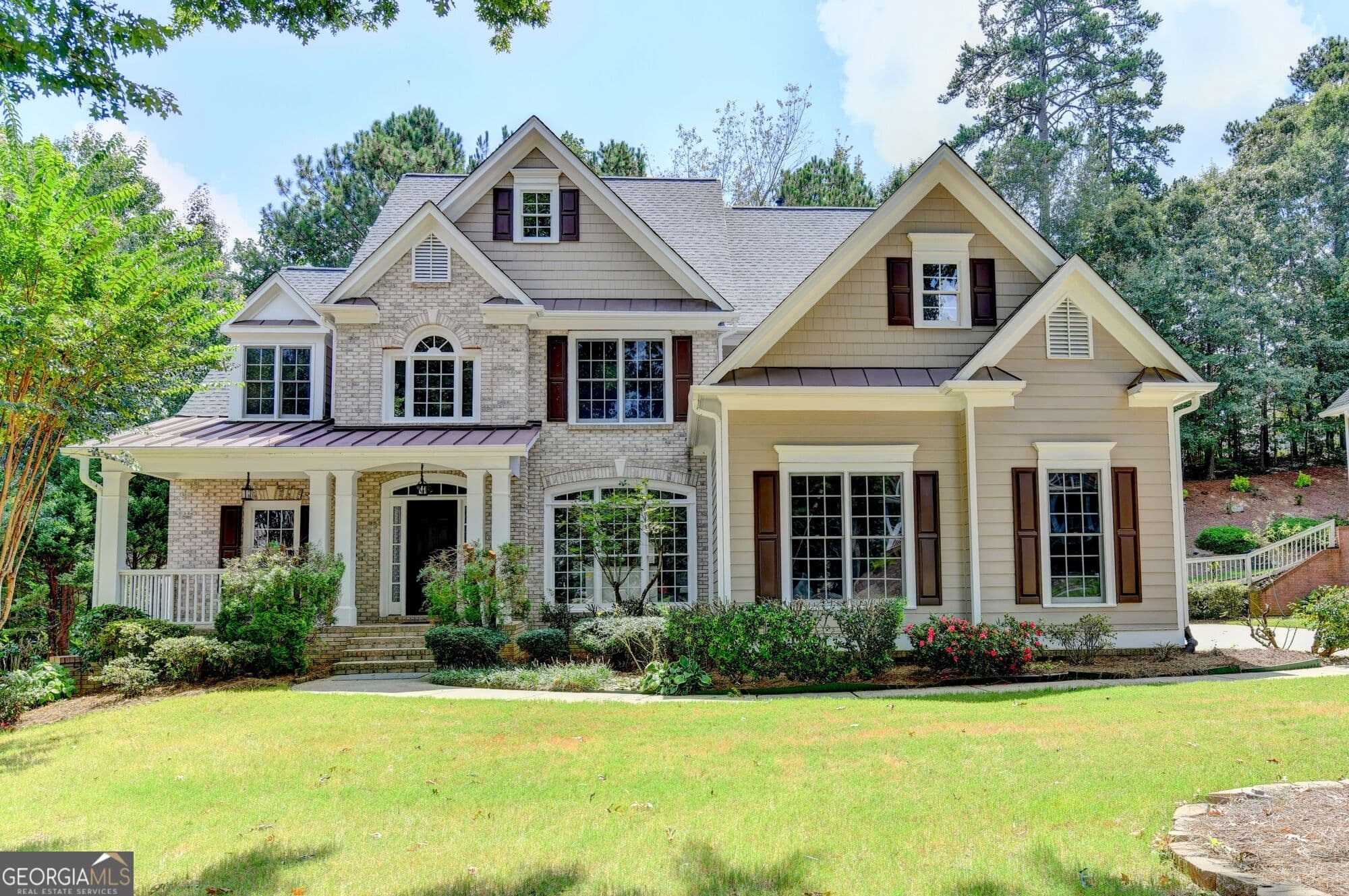 5 bedroom, 4 bathroom, 4,018 sq ft single family residence for sale at 455 Hillcrest View Drive, Suwanee, GA 30024